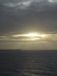 SX00133 Sun over towers on Brownstown head.jpg